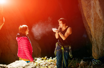 two climbers in a cave