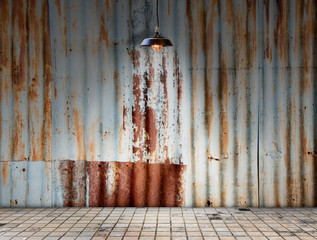 Lamp at Rusted galvanized iron plate with tile floor