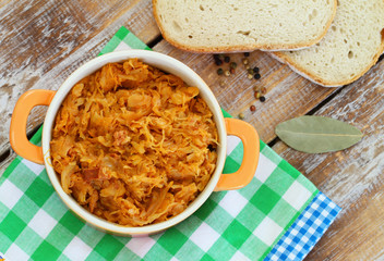 Polish bigos in saucepan
