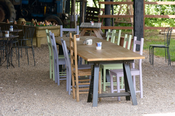 Fototapeta na wymiar Wooden long table in cafe