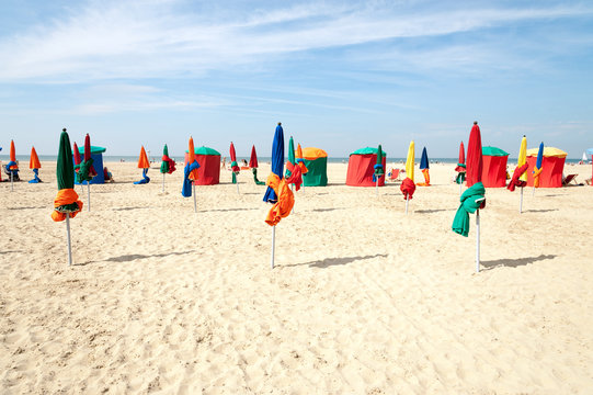 Colorful tents and umbrellas on famous Deauville beach, Normandy