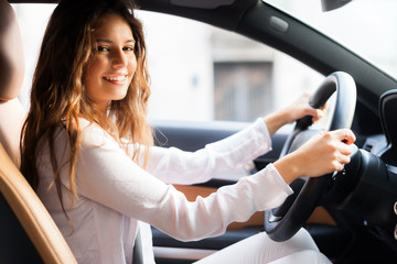 Woman driving her car