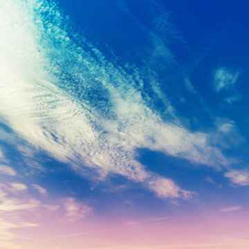 Bright cloudy sky, stylized background photo