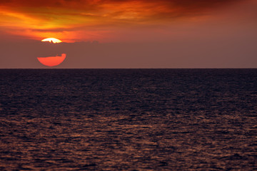 evening or morning sunrise sunset with the sun just on the horizon