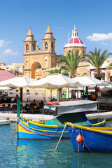 Naklejka premium Marsaxlokk, a traditional maltese fishing village, Malta