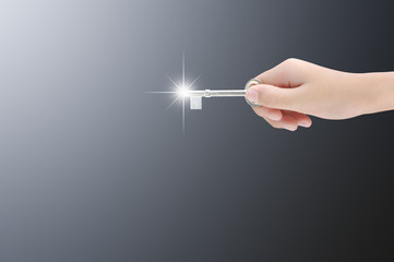 Hand holding key