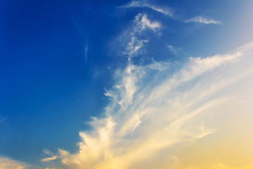 Obraz premium Dramatic sunset sky with orange colored clouds.