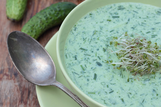Closeup of a bowl of cold cucumber and dill soup.