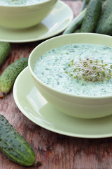 Closeup of a bowl of cold cucumber and dill soup.