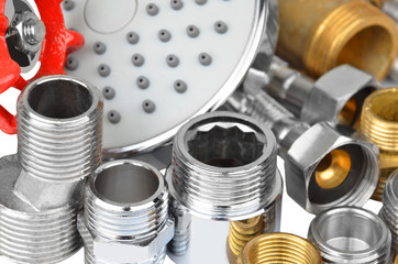 Plumbing fitting, tap and showerhead, isolated on white background