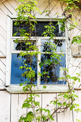 Fototapeta na wymiar window of old wooden country house