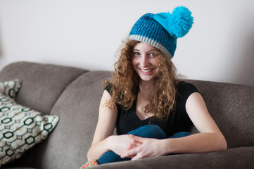 casual teenage girl wearing a hat