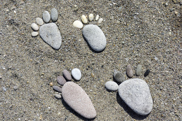 Fototapeta na wymiar foot prints of stones on beach Lesvos