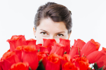 Hiding behind red roses