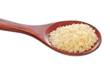white rice in wooden spoon