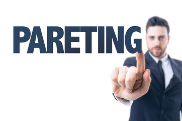 Business man pointing the text: Parenting