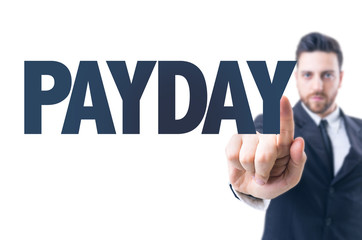 Business man pointing the text: Payday