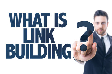 Business man pointing the text: What is Link Building?