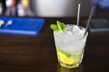Refreshing cocktail in a summer bar