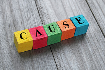 word cause on colorful wooden cubes