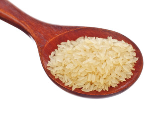 white rice in wooden spoon