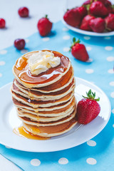 Pancakes traditional American homemade sweet dessert with honey