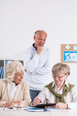 Senior women studying