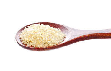 white rice in wooden spoon