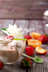 Chocolate ice cream with coffee bean and strawberry