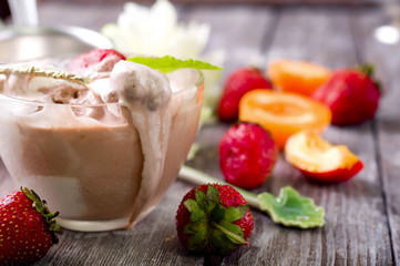 Chocolate ice cream with coffee bean and strawberry