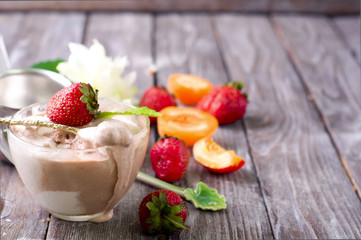 Chocolate ice cream with coffee bean and strawberry