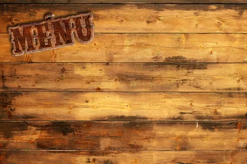 Fotobehang plate menu nailed to a wooden wall © Paulista