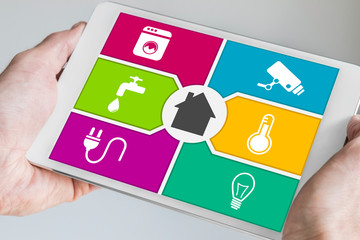 Smart home automation and mobile computing concept with tablet
