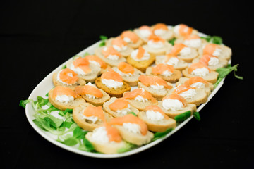 plateau with salmon mini sandwiches