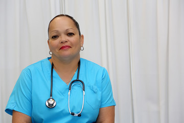 Mature Multi Ethnic Female Healthcare Professional with copy space right