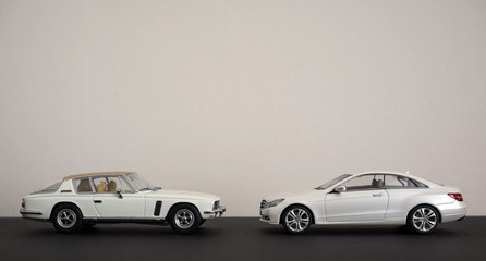 Fototapeta na wymiar White Classic Retro and Modern Luxury Sports Coupe Cars