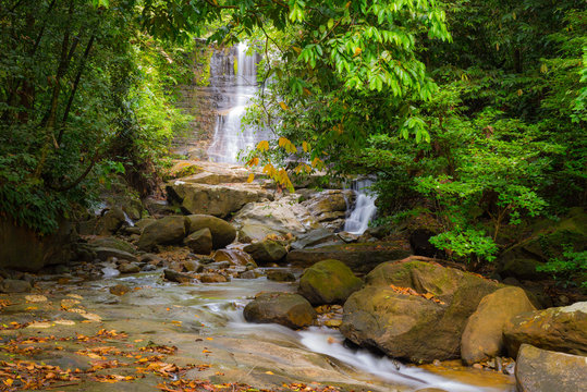 Waterfall and stream in the rainforest of Borneo