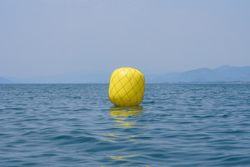 Yellow buoy for regatta