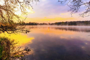 Obraz premium Serene Sunrise at the Lake in Bavaria, Germany. Lovely warm spring morning