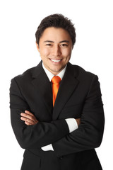 businessman in his 20s wearing a suit with an orange tie