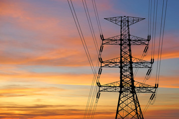 silhouette of high voltage electric tower