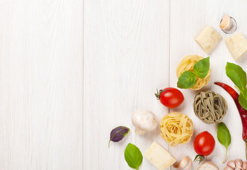 Italian food cooking ingredients. Pasta, vegetables, spices