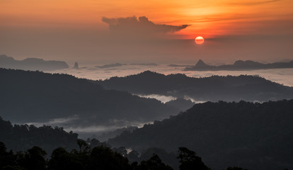 sunrise over sea fog thailand