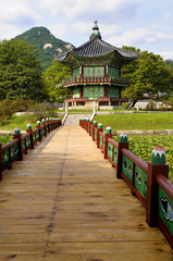 Naklejka premium Gyeongbok Palace pagoda Seoul south korea famous historical building photo with bridge
