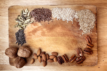 Seeds making a frame in a wooden table