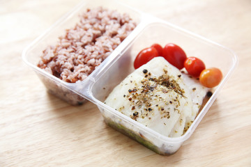 Clean food Fish steak with rice in bento