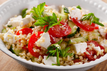 Gluten free vegetarian salad  with a feta. © bit24