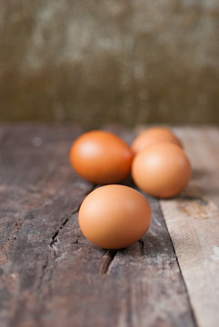 Fresh eggs on a wooden