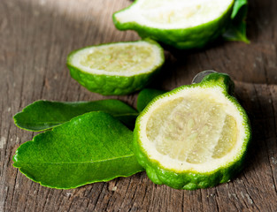 Bergamot fruit with leaf on wood
