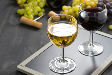 background with glasses of red and white wine